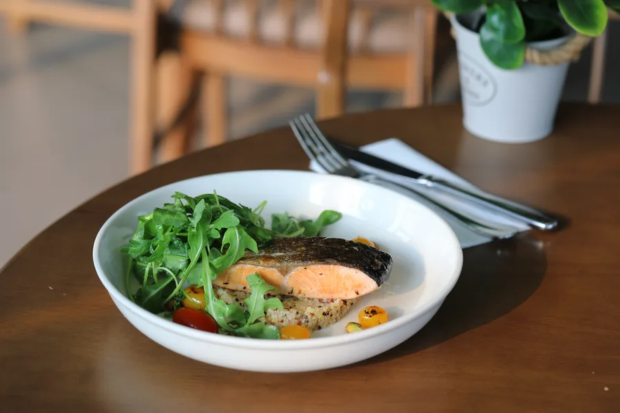 Salmon Steak with Quinoa and Rocket in Lemon Butter Sauce